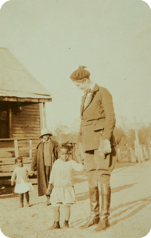 Belle with students in Hobcaw’s Strawberry Village,  circa 1930.
