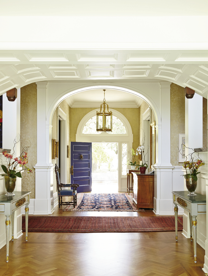 Throughout the home, all windows and wainscoting are original, as is most of the flooring. Florals by Lotus Flower