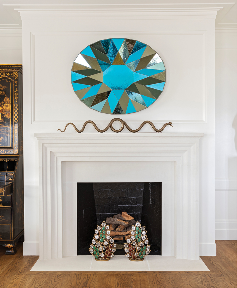 A pair of jeweled firedogs inspired by Van Cleef &amp; Arpels earrings are but one example of the clever couture-driven designs found in a not-so-traditional Federal-style manse South of Broad.