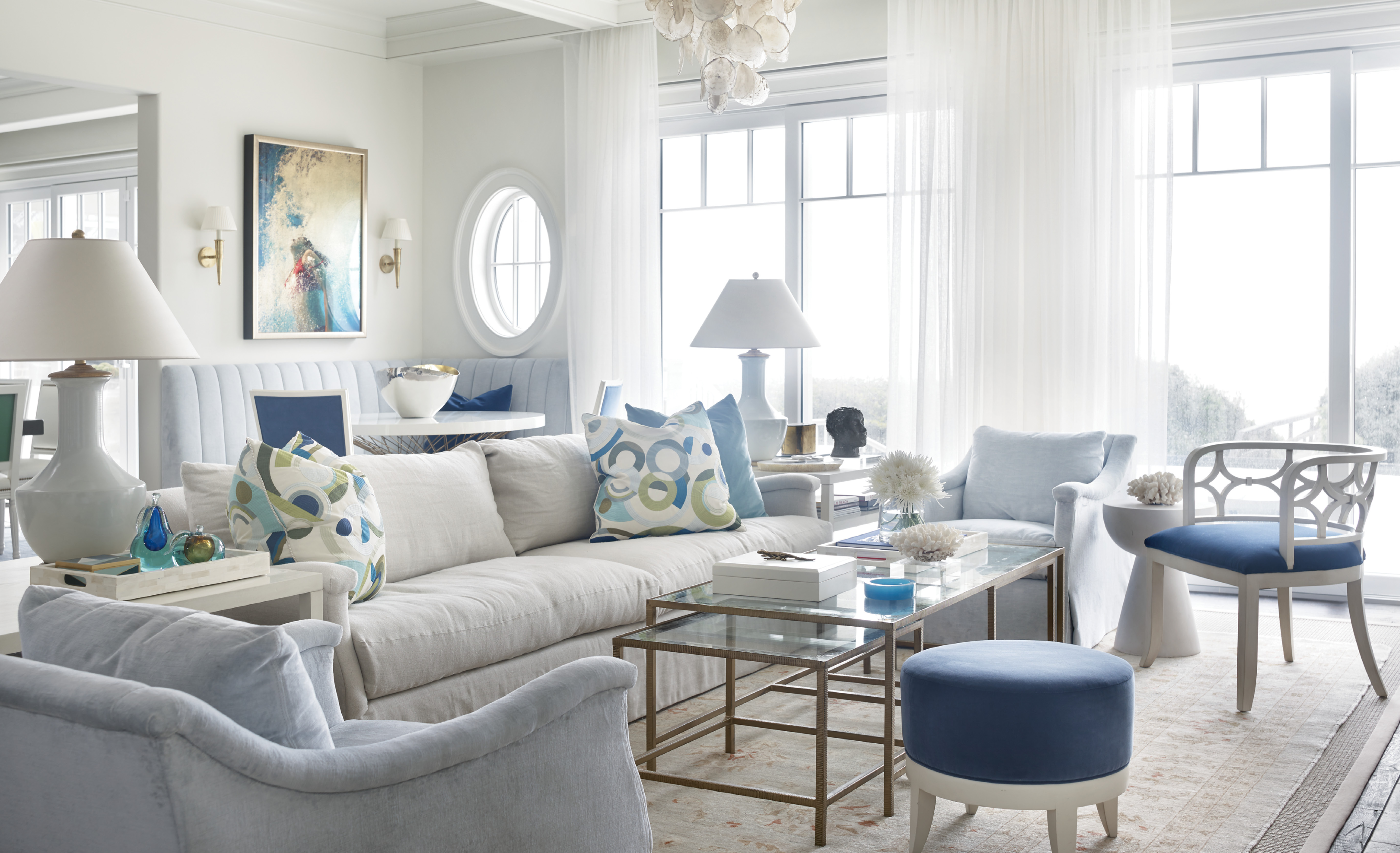 Leah and Gee Aldridge spent a decade planning and collecting for their custom beach house on Kiawah Island. The interiors are peppered with meaningful mementos, such as the painting by artist Eric Zener that the couple found in a Boston gallery and now hangs over the banquette.