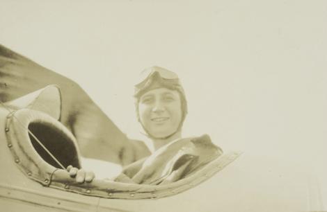 In the cockpit on her first flight with friend and pilot Evangeline Johnson in 1916