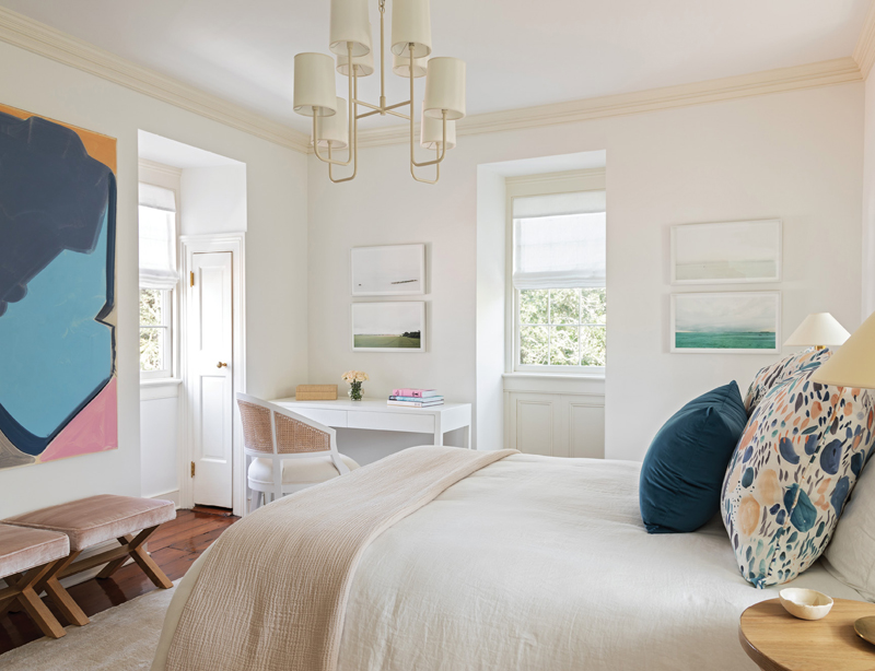 The third bedroom has a playful feminine feel, enhanced by the large painting by Brooklyn artist Patricia Treib and a quartet of serene landscapes by Los Angeles-based photographer Sze Tsung Nicolás Leong.