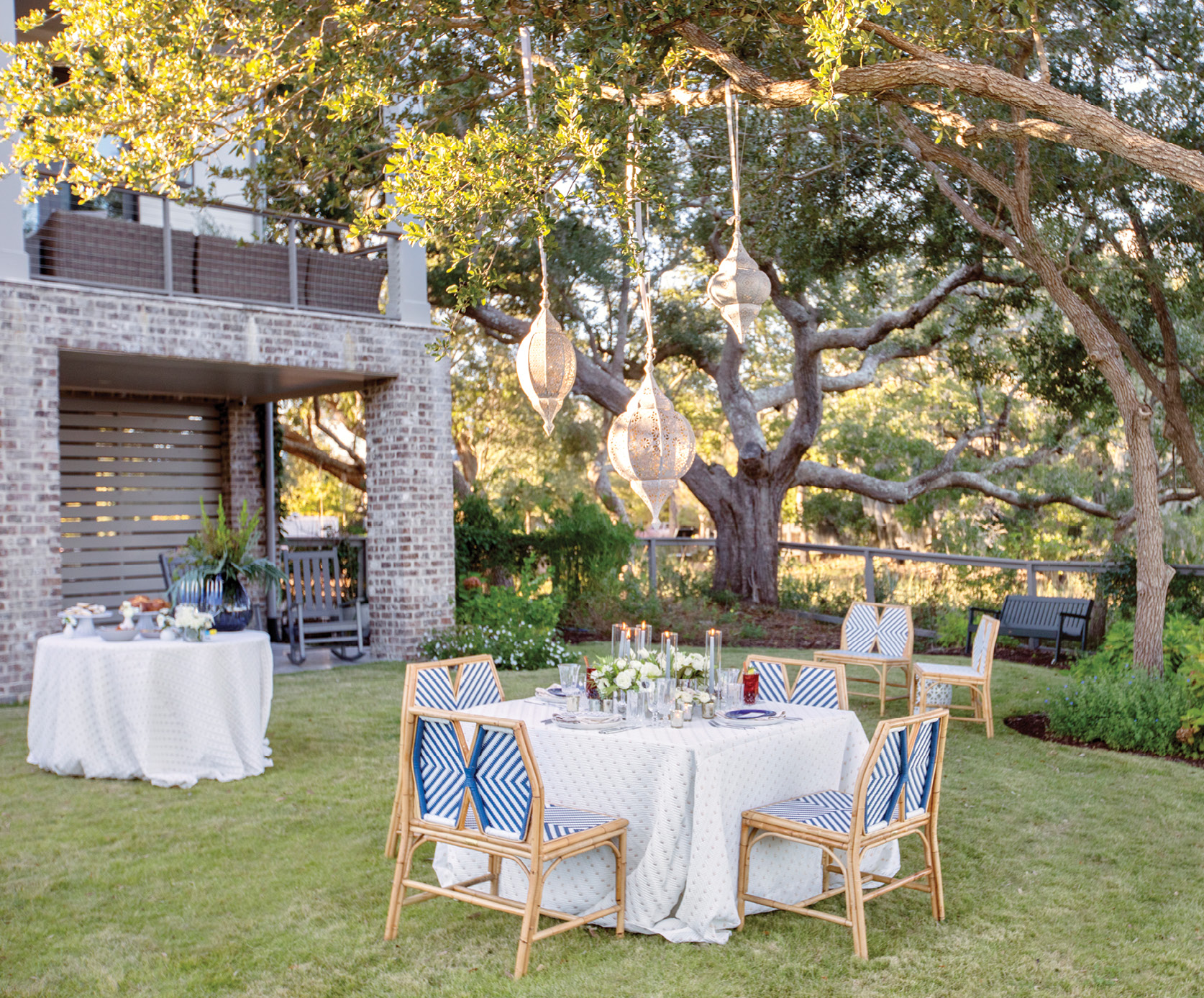 Robinson hung the family’s outdoor lanterns over the adults’ dining table, candlelit and shimmering with mercury glass