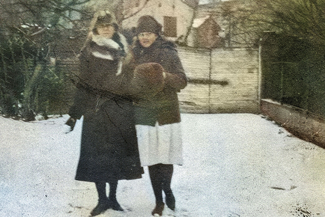 Snowball Fun, circa 1922, by an unknown photographer Wrapped in a fur collar, Eleanor Johnson Maybank holds a snowball as she stands with daughter, Anne Lucas Maybank, in the backyard of 68 Meeting Street.