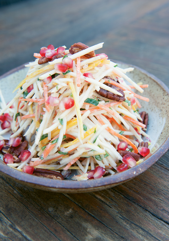 Bright Side: Pomegranate seeds, rainbow carrots, parsley, and pecans add pops of color to the dish.