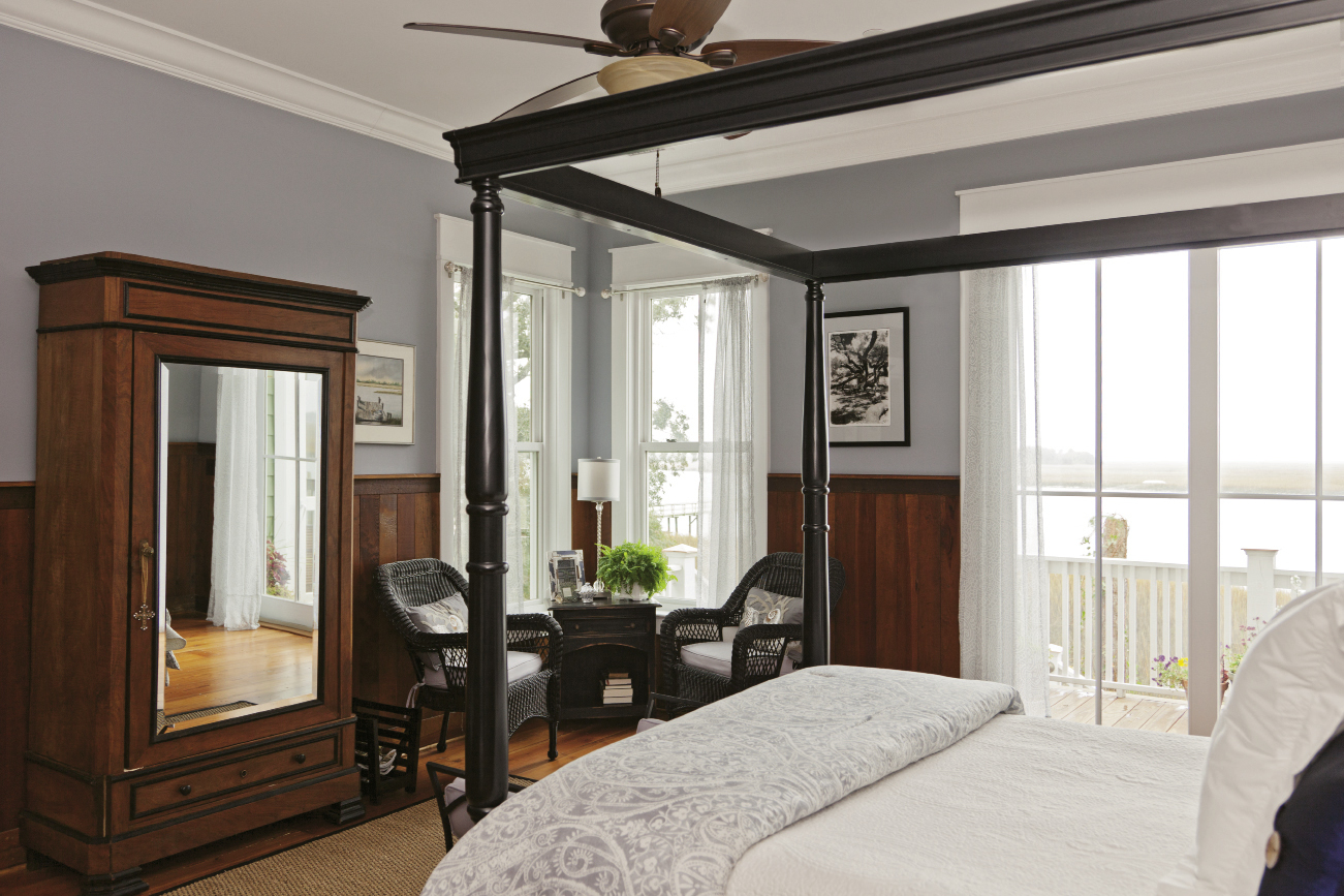 The Barbers accented their bedroom with an heirloom armoire from Robert’s mother