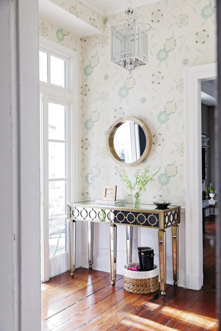 Youthful Impression Stodgy striped wallpaper was replaced with a breezy, happy pattern in Lauren and David Lails’ foyer, immediately announcing that this century-old abode has spunky new life.