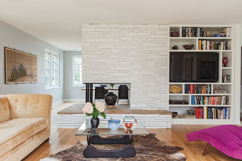 And built-in storage was added—its shelves vary in size to mimic the patterns of brick in the fireplace.