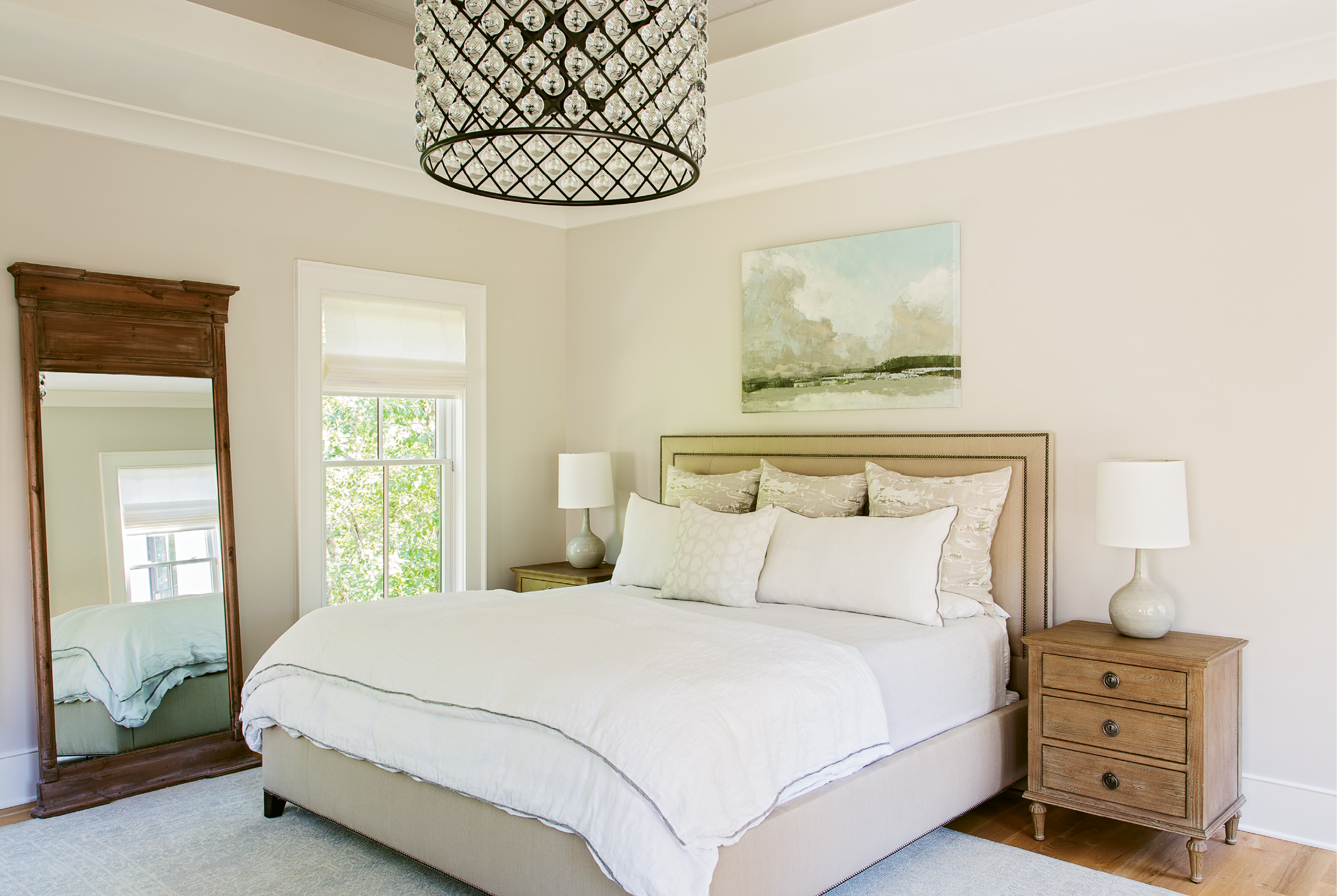 Dreamy Drama: “It’s my favorite thing in the house,” says Theresa of the big, dramatic light fixture in the master bedroom, a constellation of mini-globes reflecting light in dazzling gentleness. “Keeping the décor neutral and simple allows for going big and making statements with the light fixtures,” notes Lenox.