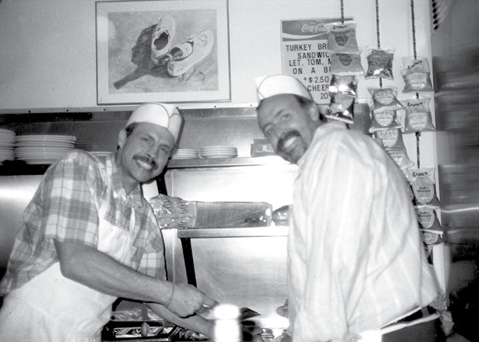 Brothers C.M. and Cliff Williams in the Goodie House kitchen in the 1970s