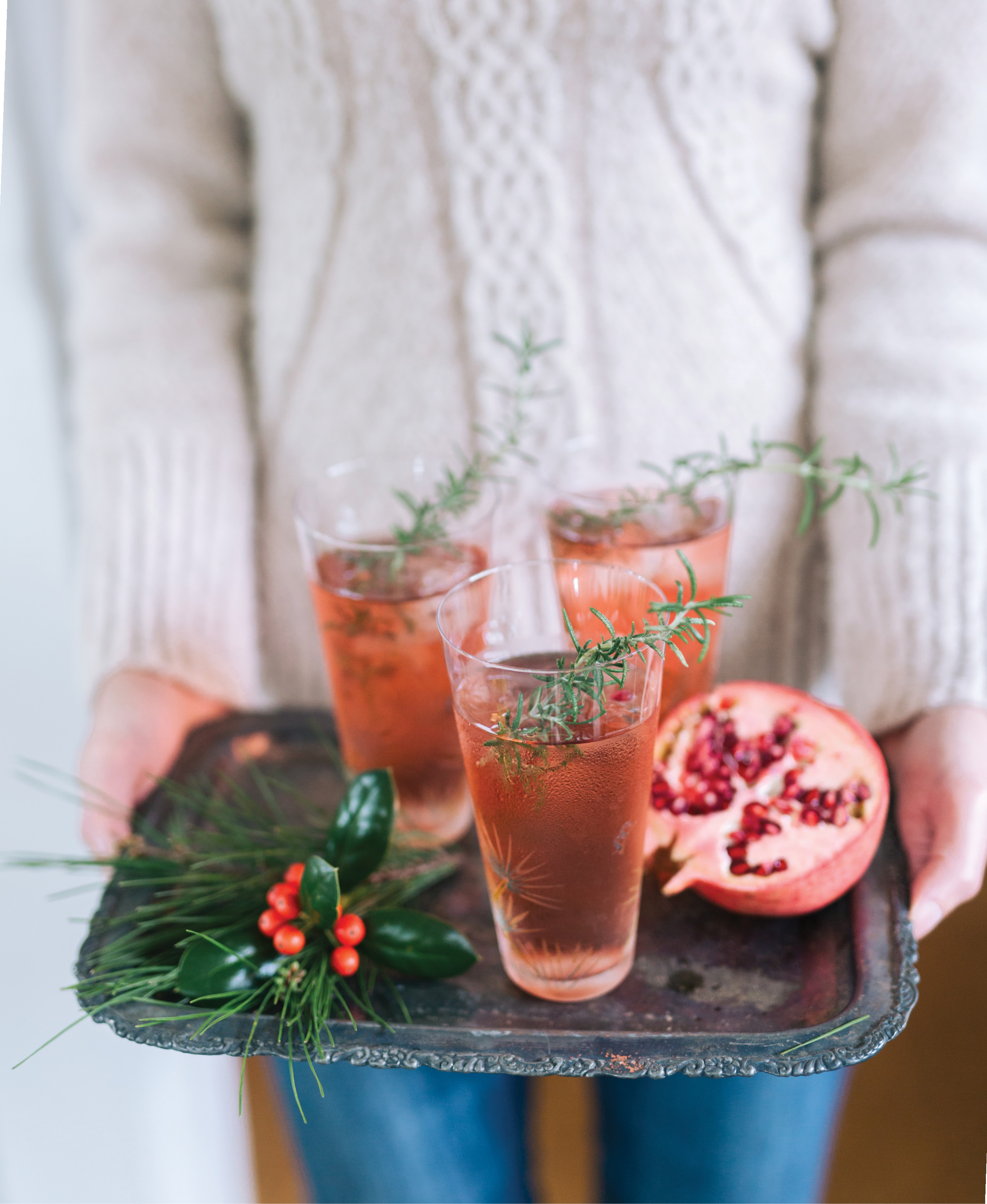 Offer guests a special cocktail, like this pomegranate spritz, as soon as they walk in the door, but do have other options available, as well.