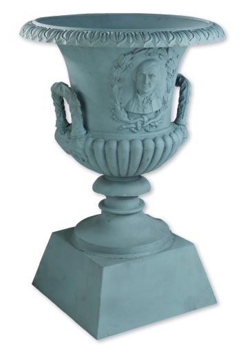 Circa-1860 cast-iron garden urn: Adorned with raised busts of George Washington in laurel wreaths, this 36-inch-high piece is among the garden furnishings Aileen Minor Antiques is bringing from Maryland.