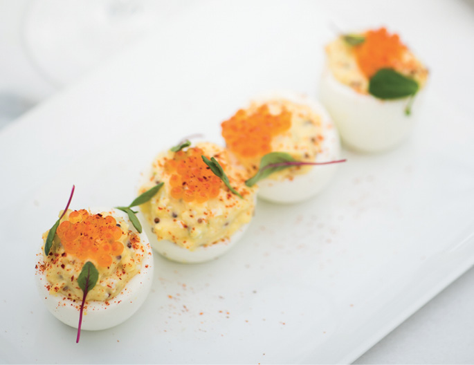 Eggs on eggs: Trout roe sits atop tangy deviled eggs, offered on both the lunch and dinner menus.