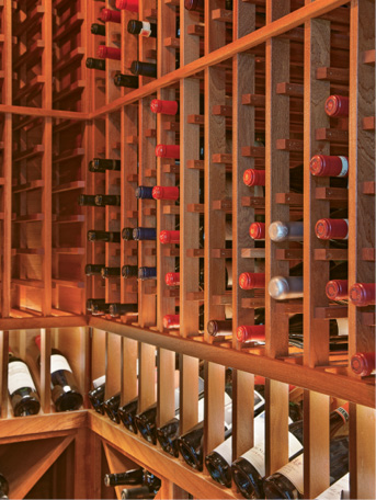 CROWN JEWEL: Tucked into the brick wall of the kitchen, the petite wine cellar holds 950 bottles.