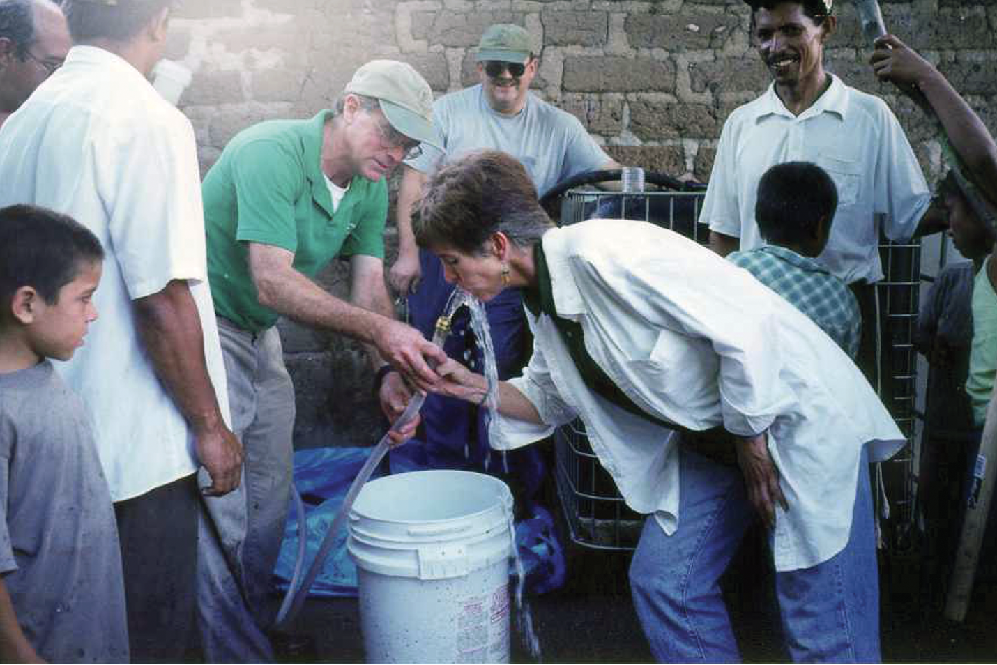 By taking the first sip, Molly Greene assured residents in Honduras that water from the River of Death was safe to drink after being treated.