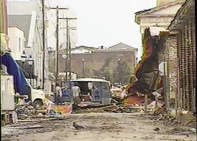More views of the destruction downtown, including the Market littered with mud and crumpled metal debris from buildings