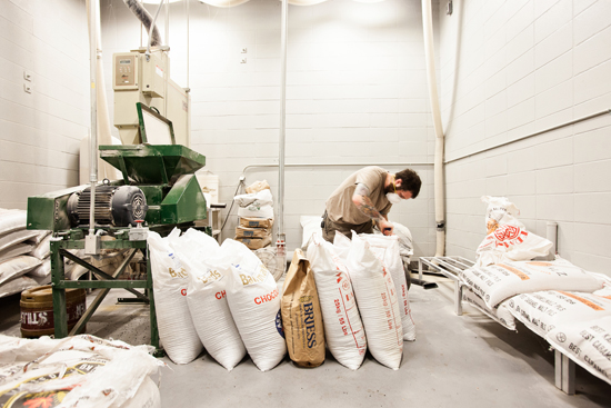 Mike Levin preparing to mill grain for the next batch