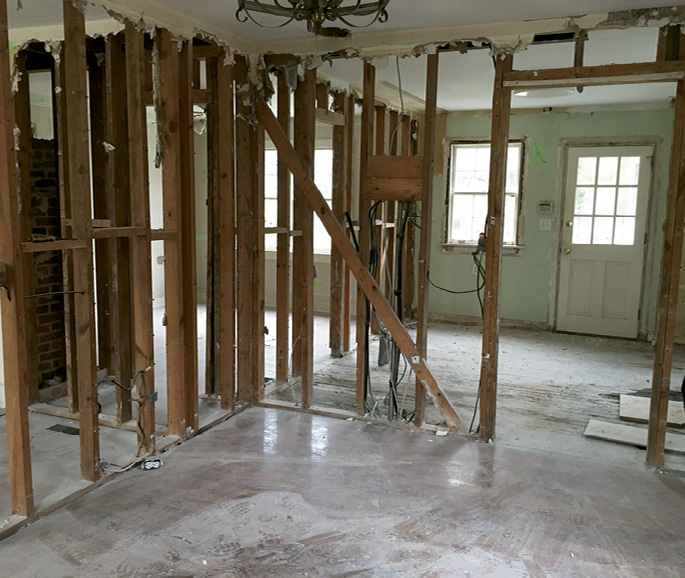 To achieve an open floor plan, Solid Renovations removed three and a half walls from the ground floor.