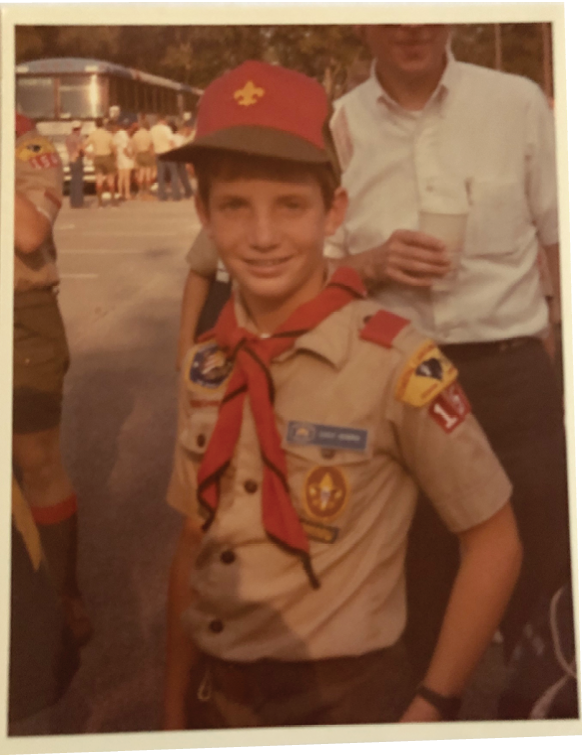 As a Boy Scout; “I’m not sure he earned many badges, but his troop leader said as an entertainer, Sunshine was invaluable,” says his mom.