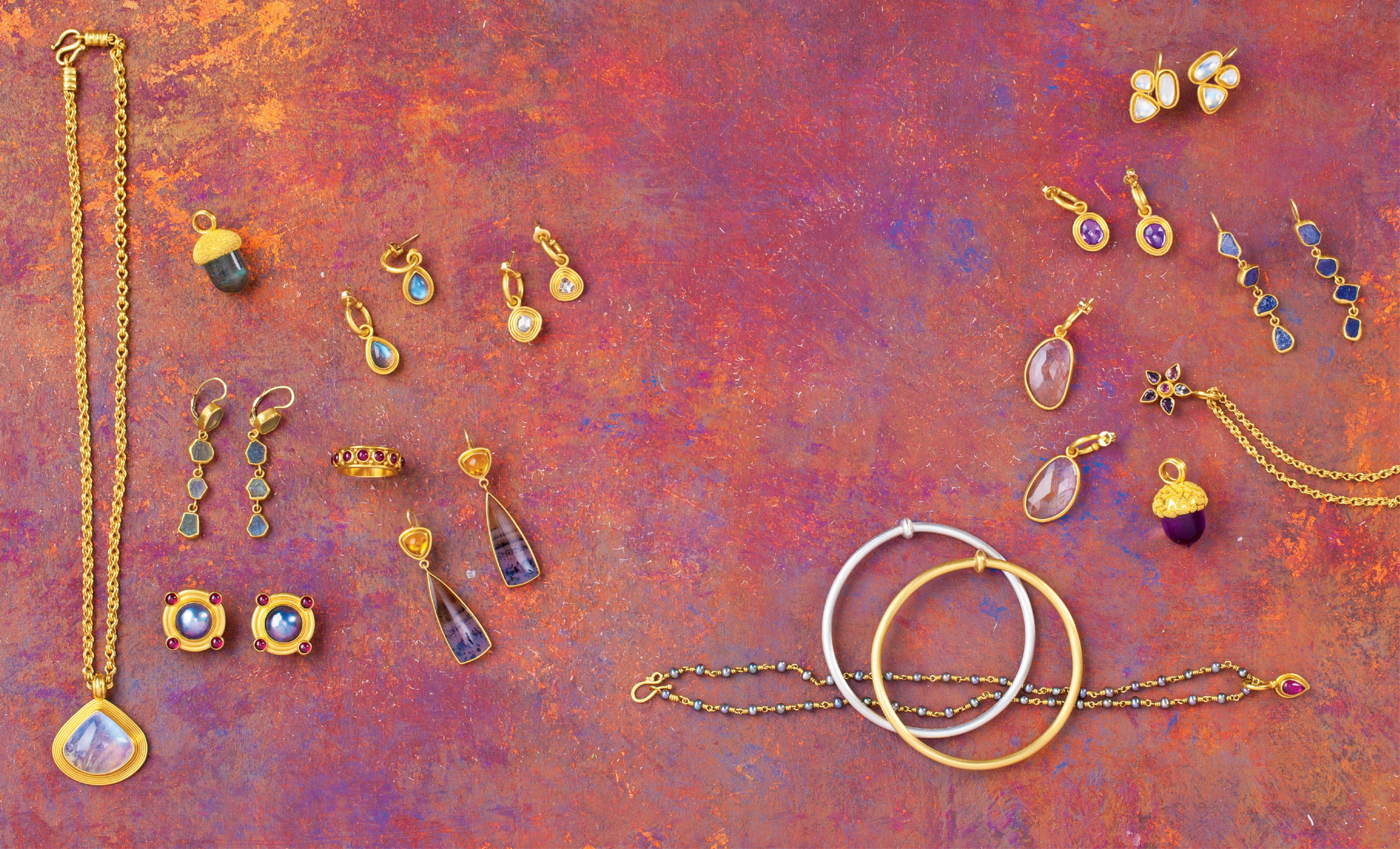 Sarah Amos: Fine jewelry collectors know a Sarah Amos piece when they see one; it’s all in the painstaking, handcrafted details, such as the individually placed gold granulation on her “Amethyst Acorn Pendant” (at right). The master goldsmith, who studied at Kulicke-Stark Academy of Jewelry, uses ancient techniques to transform 22K gold and precious and semiprecious stones into gorgeous, one-of-a-kind pendants, earrings, rings, and more. “My jewelry is informed by classical techniques, but the results must be wearable and have a contemporary aesthetic,” says the artist, whose work is available at Helena Fox Fine Art, helenafoxfineart.com.