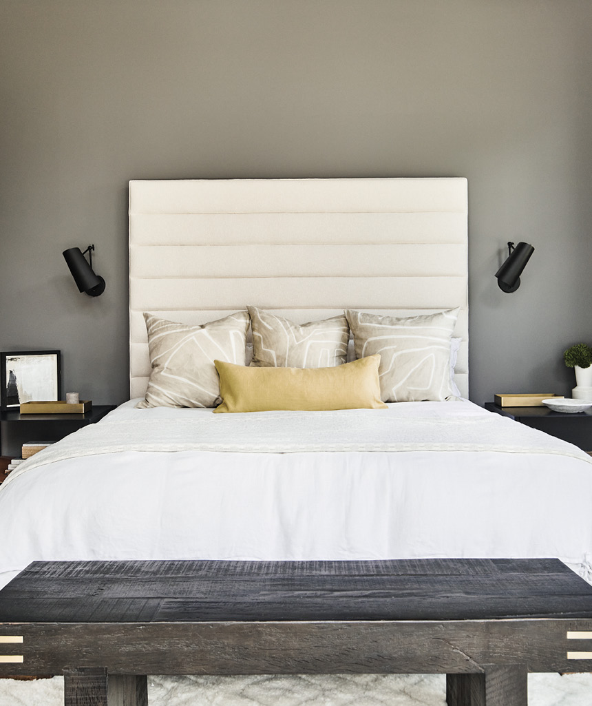 Jones sourced the one-of-a-kind bed in Los Angeles, completing it with an ivory boucle-wrapped headboard from Fritz Porter in Charleston.