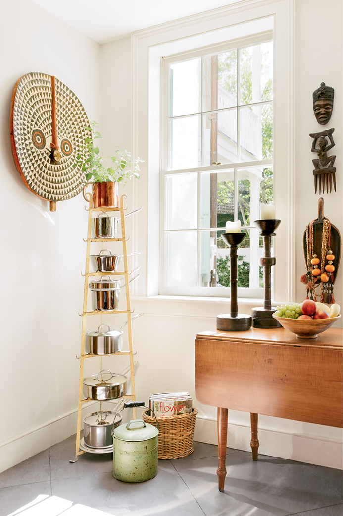 From Ethiopian carved wood candle holders to a Croatian honey pot, artifacts collected during Monica’s many travels lend a global aesthetic to the interiors.