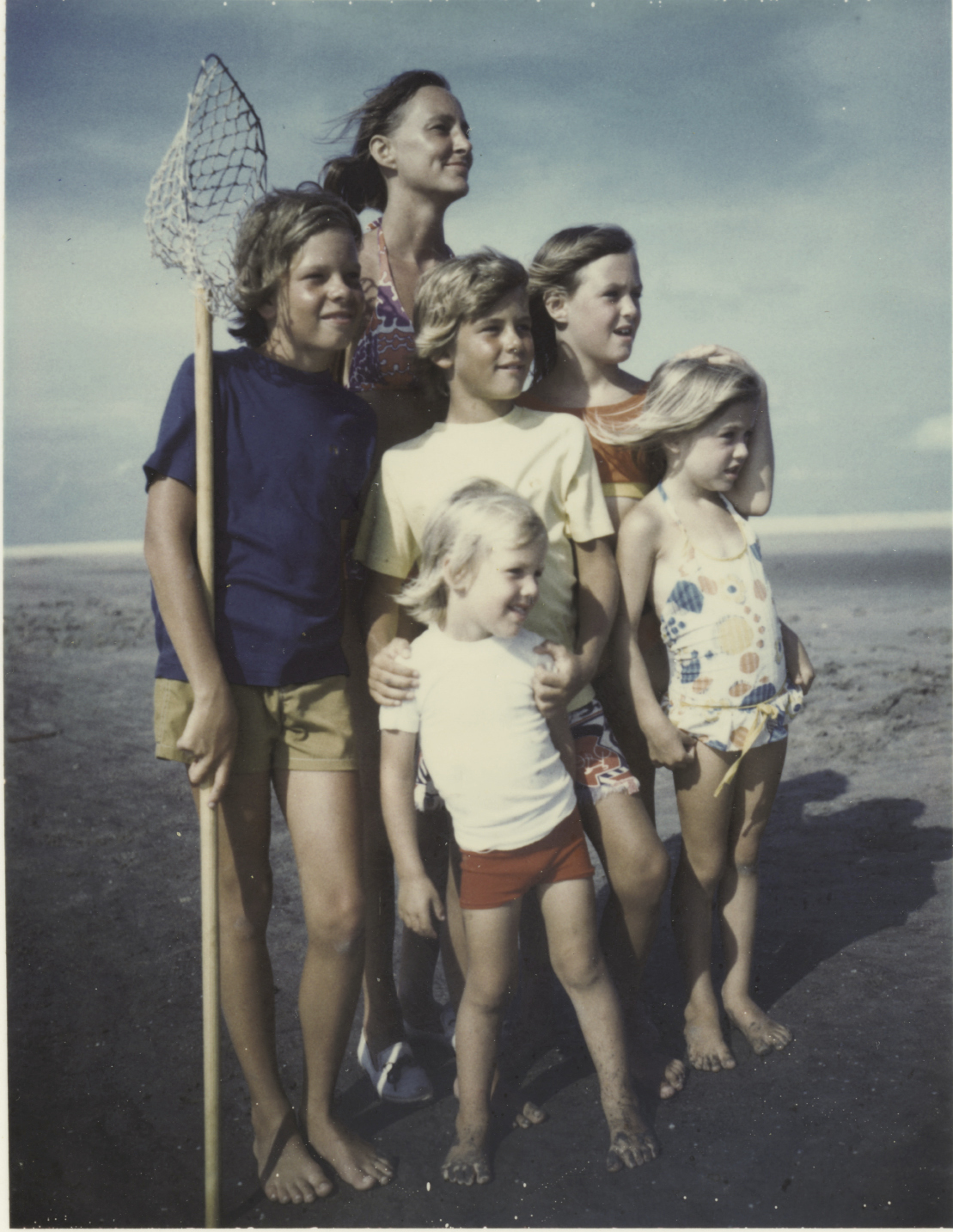 Author Edward Marshall’s stepmother, Lynn, stands ready to catch crabs with her extended brood.