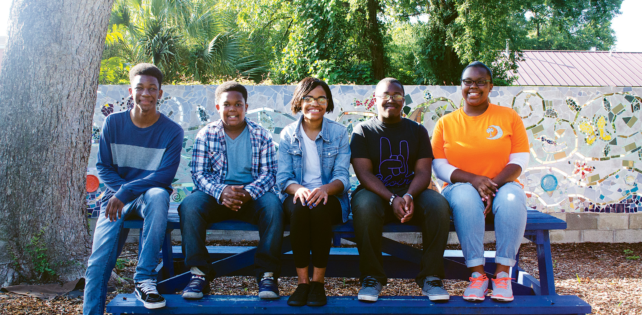 Robert Pickering III, Knicholas Pickering, Brianna Stanley, Chandler Threatt, and Reagan Pickering are among the teens who tend the downtown garden.