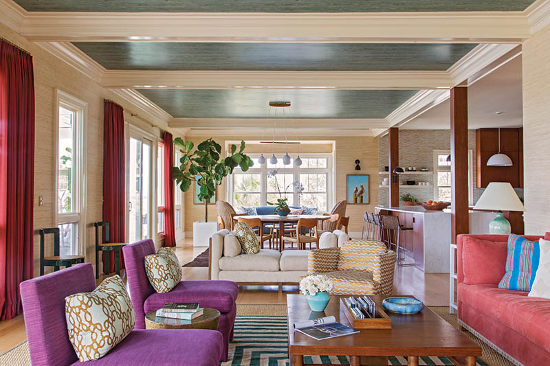 Beyond Neutral: Airy, relaxed, and “get me out of my box” was owner Rebecca Ufkes’s directive to interior designer Angie Hranowsky, who obliged by wallpapering the ceilings in Nobilis “Faux Bois” in a subtle teal green, reorienting the living space toward the water view, and sprinkling in jazzy patterns and hues of purple, orangey reds, and blue.