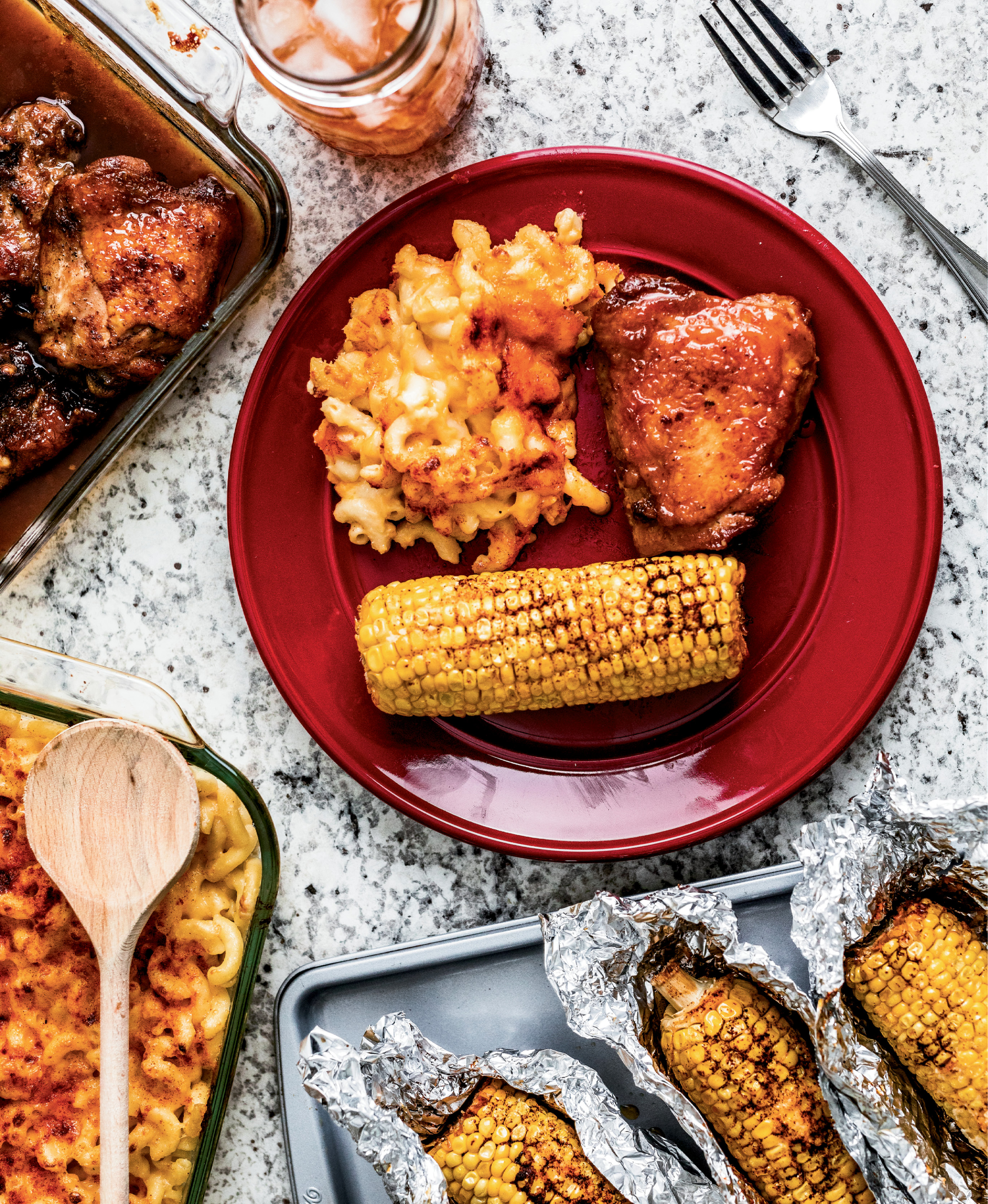 Sweet honey-glazed chicken gets kicked up a notch with sides of paprika-seasoned mac-n-cheese and corn on the cob.