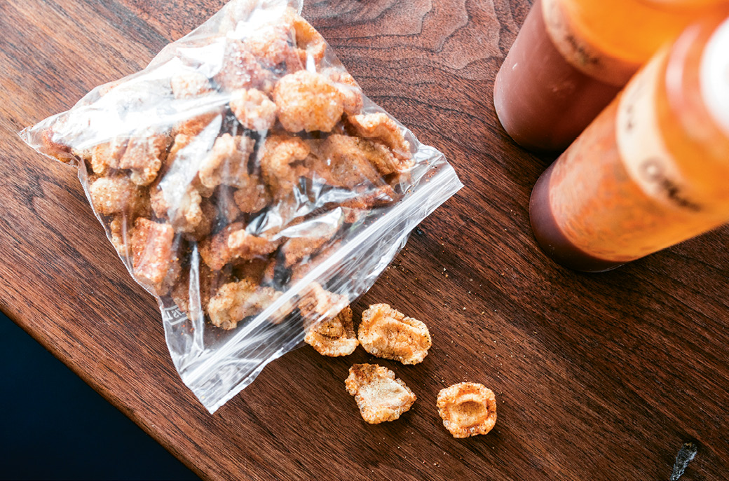 SNAP, CRACKLE, POP: Cracklins, made up of deep fried pork skins puffed to a crisp, are sold by the bagful.