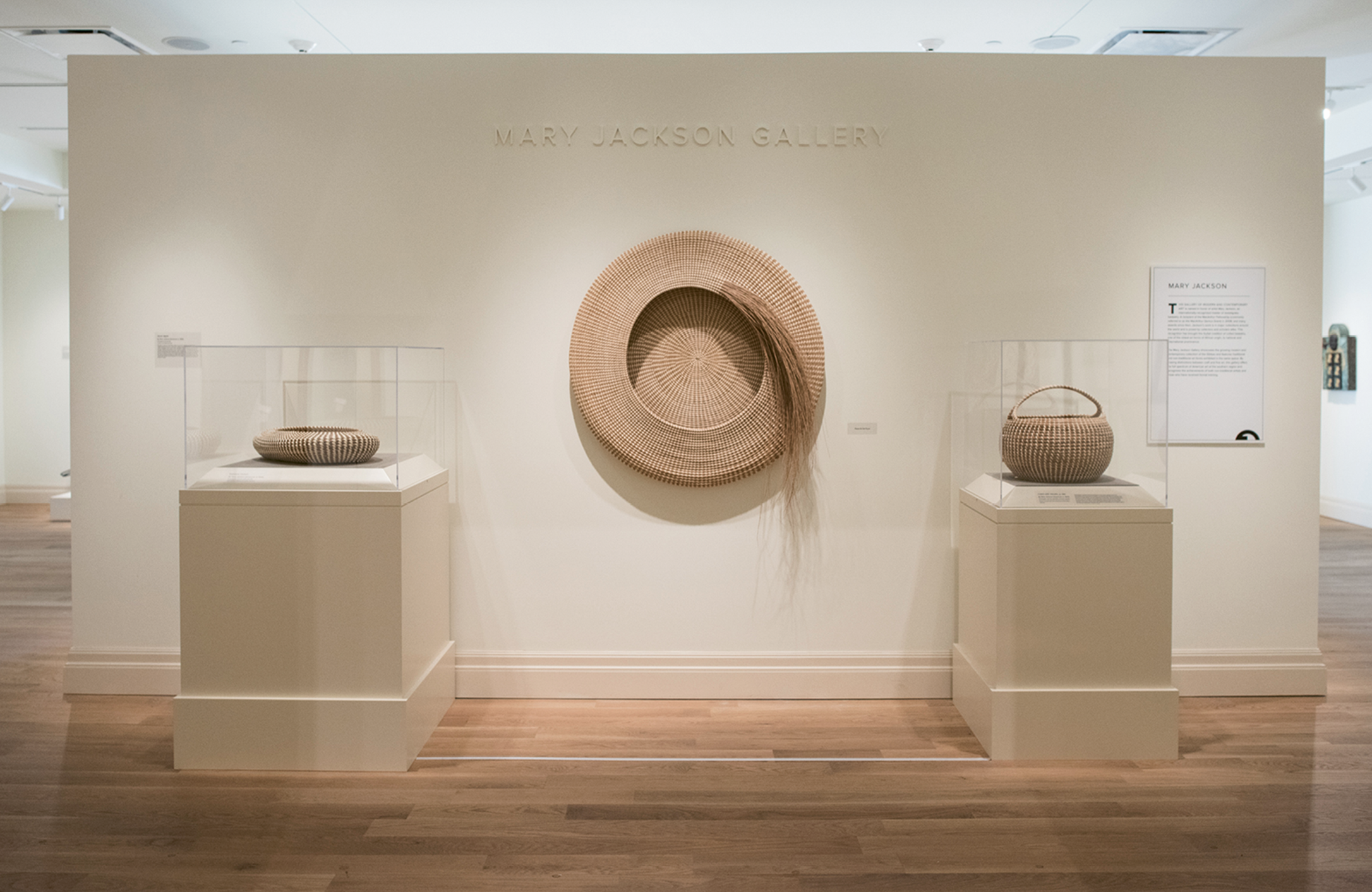 Modern Master: When the Gibbes reopened after an extensive renovation in 2016, the modern and contemporary galleries were named in Jackson’s honor. Her pieces are part of the museum’s permanent collection, including (center) Never Again and (right) Cobra with Handle (circa 1980; sweetgrass, bullrush, and palmetto; 15 x 16 inches), as well as (left) Diploma (sweetgrass, bulrush, and palmetto) which is on loan from a private collection.