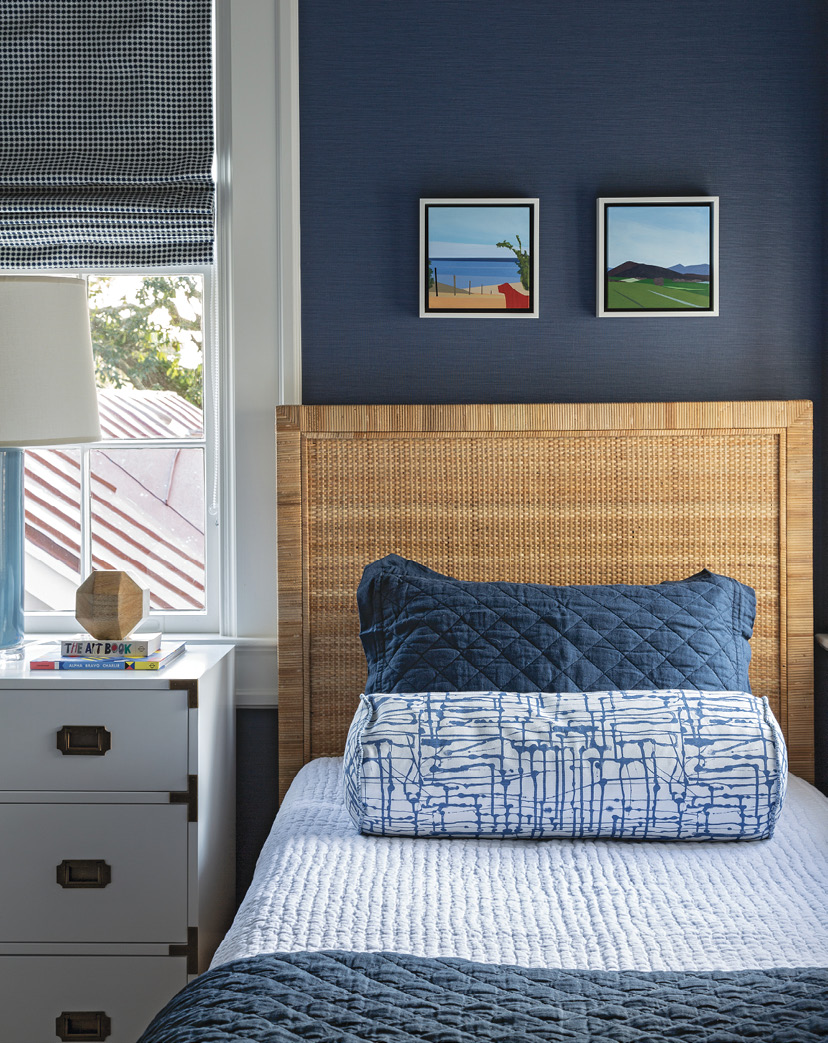 COOL BLUES: In the main house, the boys’ bedroom bucks the white trend with a Philip Jeffries vinyl wall covering that’s a cinch to wipe clean.