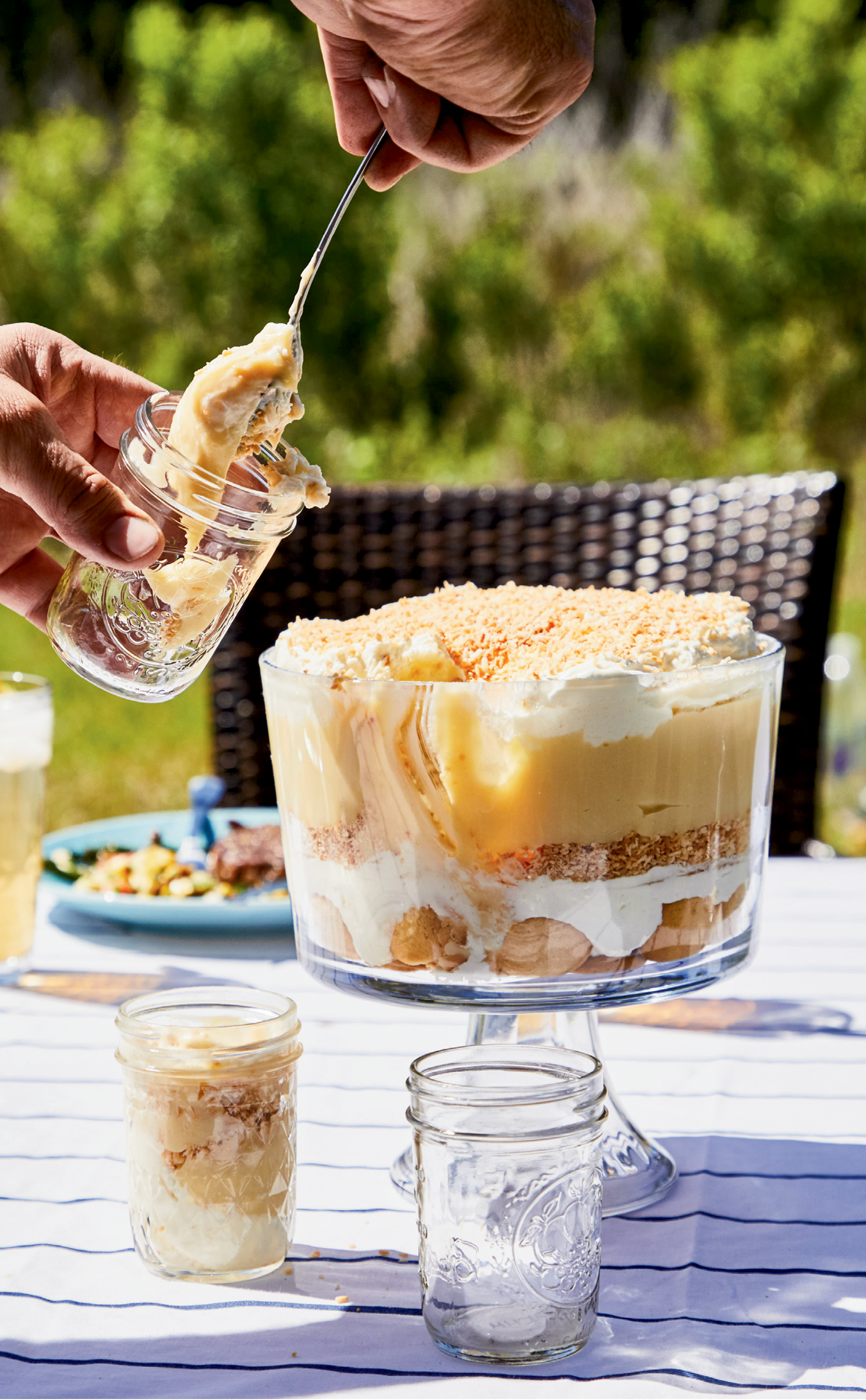 Tropical Twist: Bands of coconut pudding and toasted coconut mingle with whipped cream and vanilla wafers in this luscious spin on the classic banana pudding dessert