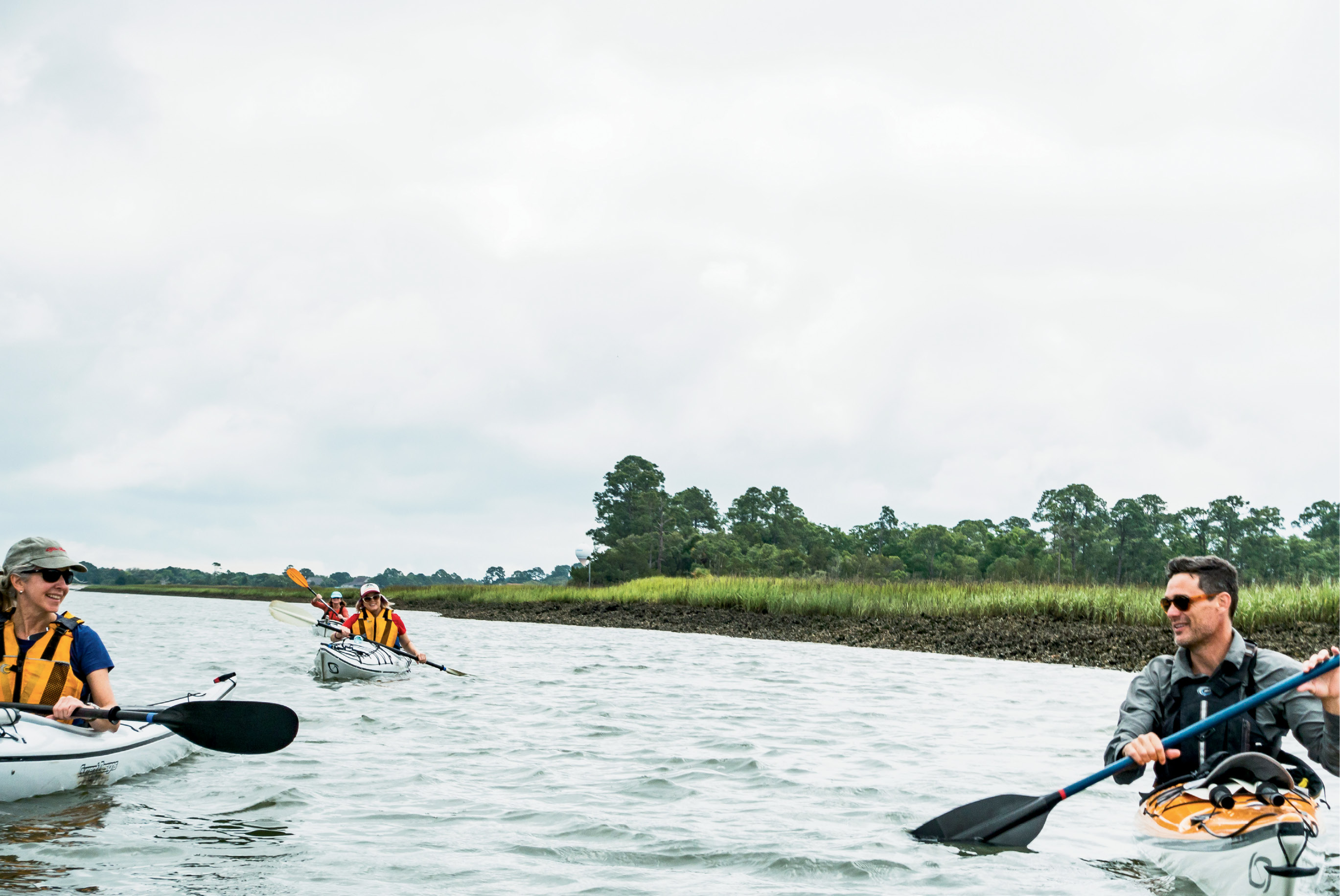 Kayak Farm guide-owner Eric Gibbons leads a group of paddlers through Fripp Inlet.