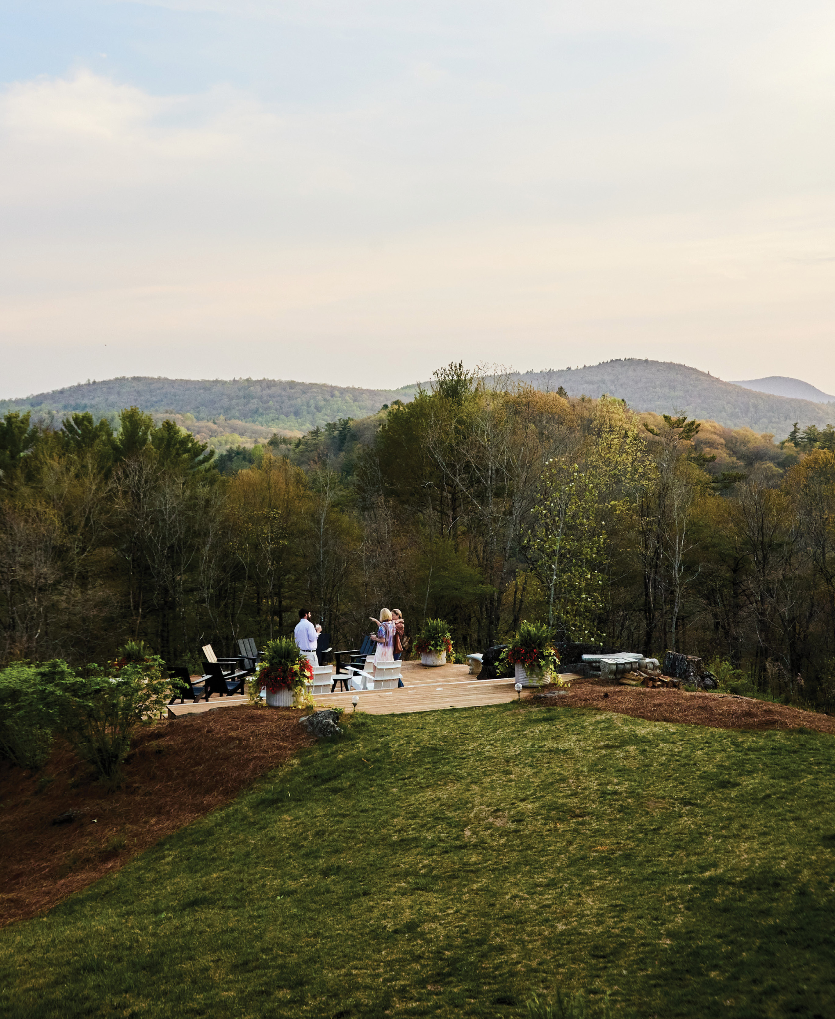 Mountains for Miles: A pre-dinner gathering on a patio at the 50-acre Skyline Lodge. Founded in 1875, the North Carolina town was promoted from its start for the cooler climate, healthy air, and excellent potential for orchards and gardens.