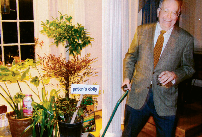 TEAM EFFORT: Peter with a dolly full of plants—always there to cheer and support his wife’s passion for gardening