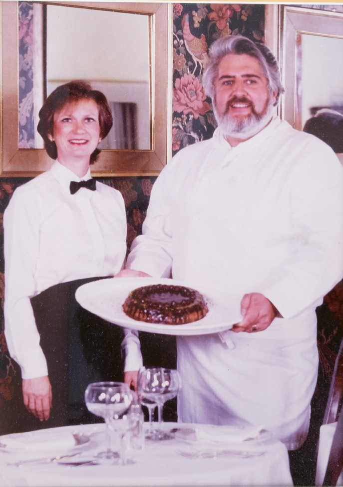 Pam and Robert Dickson in the dining room of their Rainbow Market location