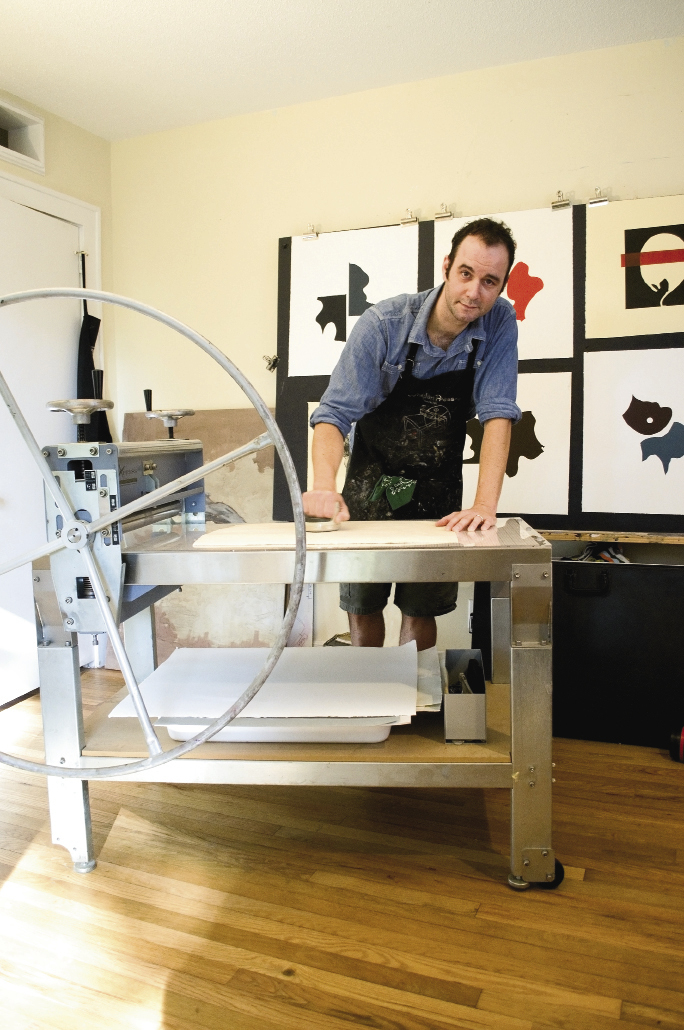 In his Avondale home studio, Ailstock creates monoprints, woodcuts, and etchings on an etching press.