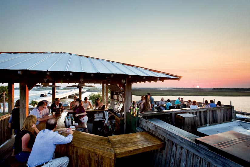 Sunset at The Boathouse at Breach Inlet’s rooftop Crow Bar