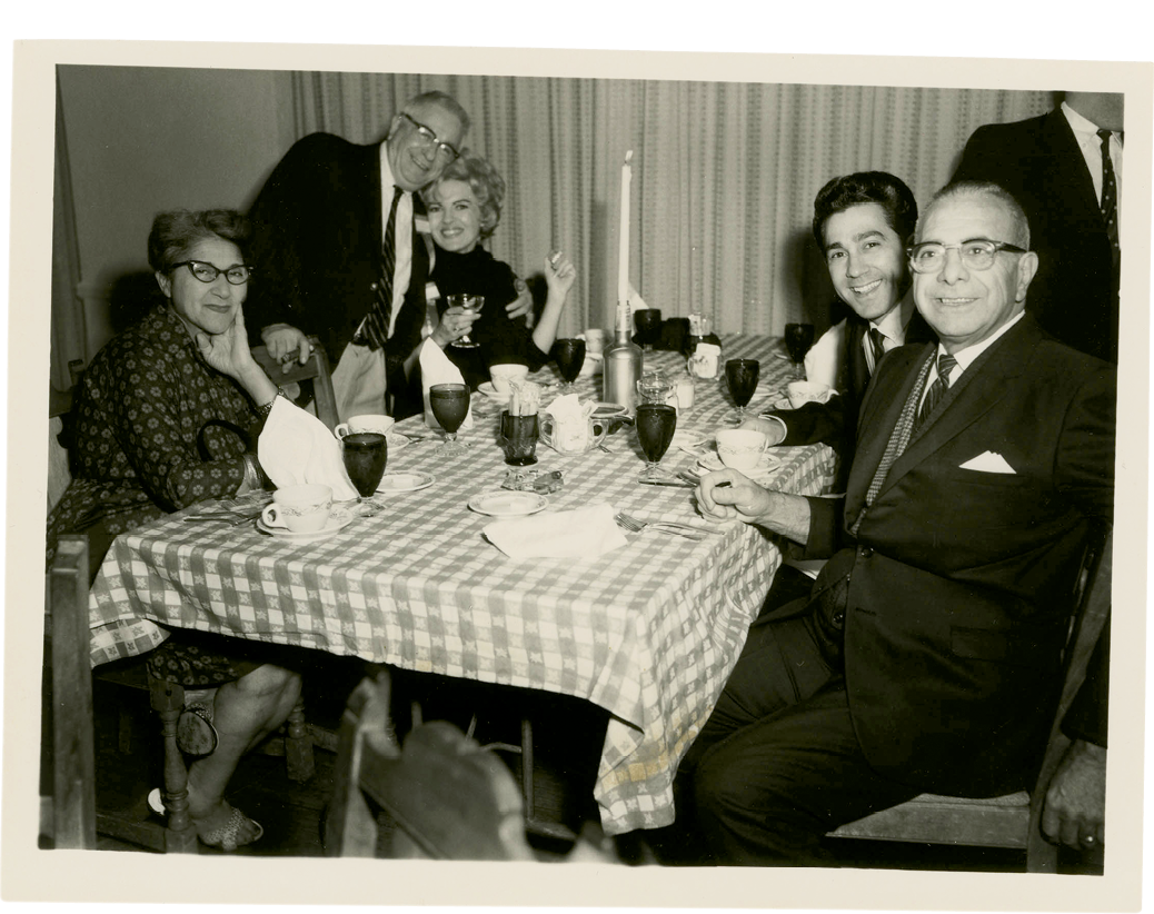 The LaBrasca family (with Effie at left and George Sr., at right) having dinner at the restaurant in the 1950s