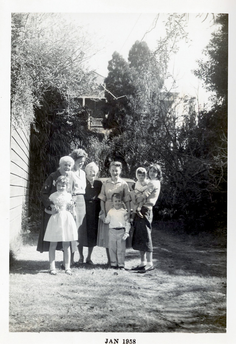 Harry McInvaill’s mother, Eva Maye, with Caroline, Harry, and Alice in the garden