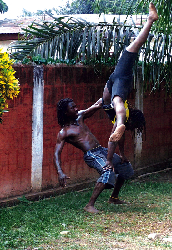 Two members of Nkabom defy gravity.