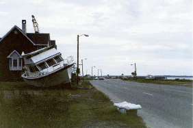 The peninsula didn’t escape the wrath of Hugo. Wind gusts at the Custom House were clocked at 108 mph, and nearly 11 feet of tidal surge washed through the area. The results included felled trees and power lines; damage to roofs and buildings; and boats tossed inland, such as this motor cruiser on Lockwood Boulevard
