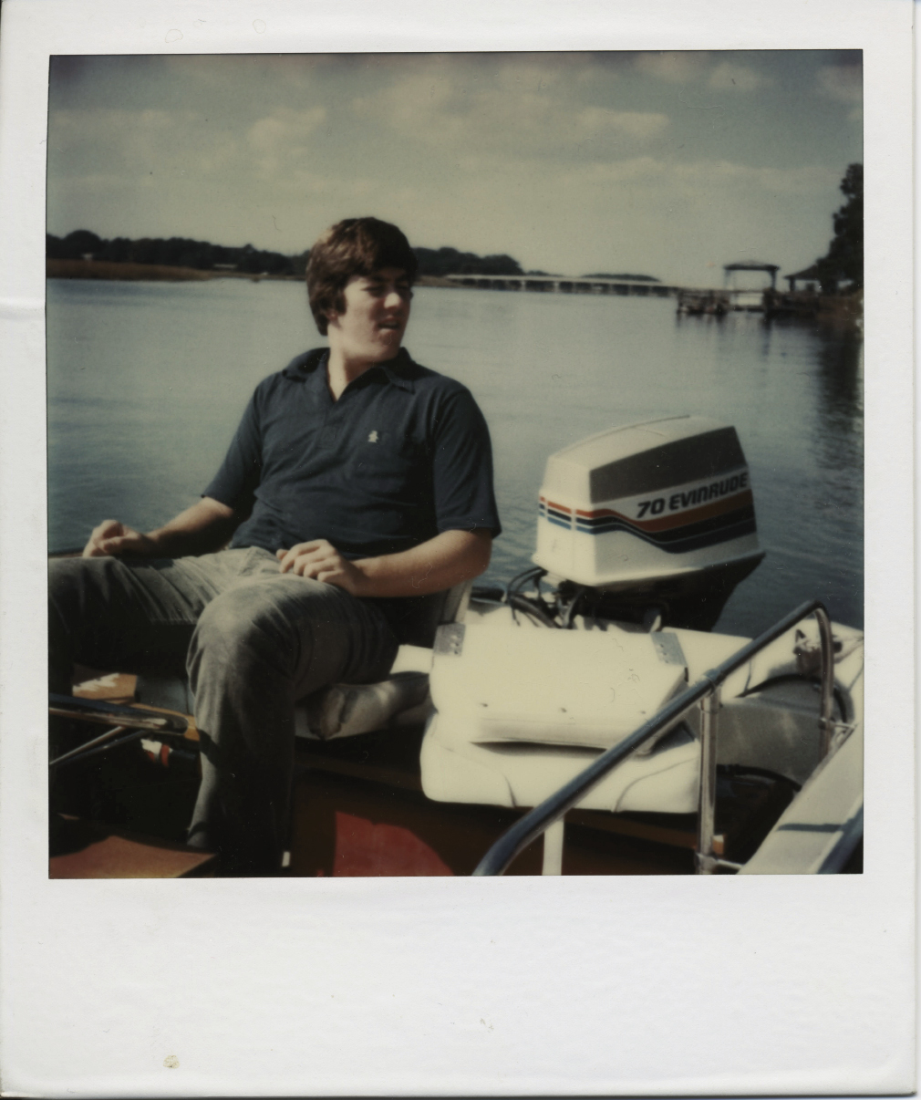 Author Julian Buxton as a 15-year-old in his boat