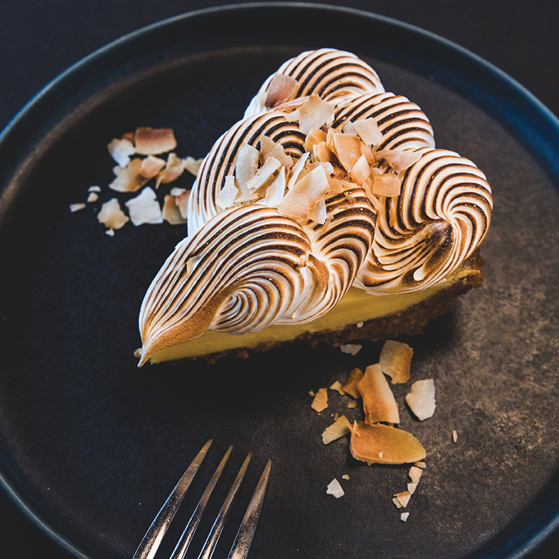 Edmund’s Oast pastry chef Heather Hutton started tinkering with dessert recipes as a child, favoring seasonal ingredients that balance sweetness and add new flavor profiles, as seen here in her decadent yuzu key lime pie.