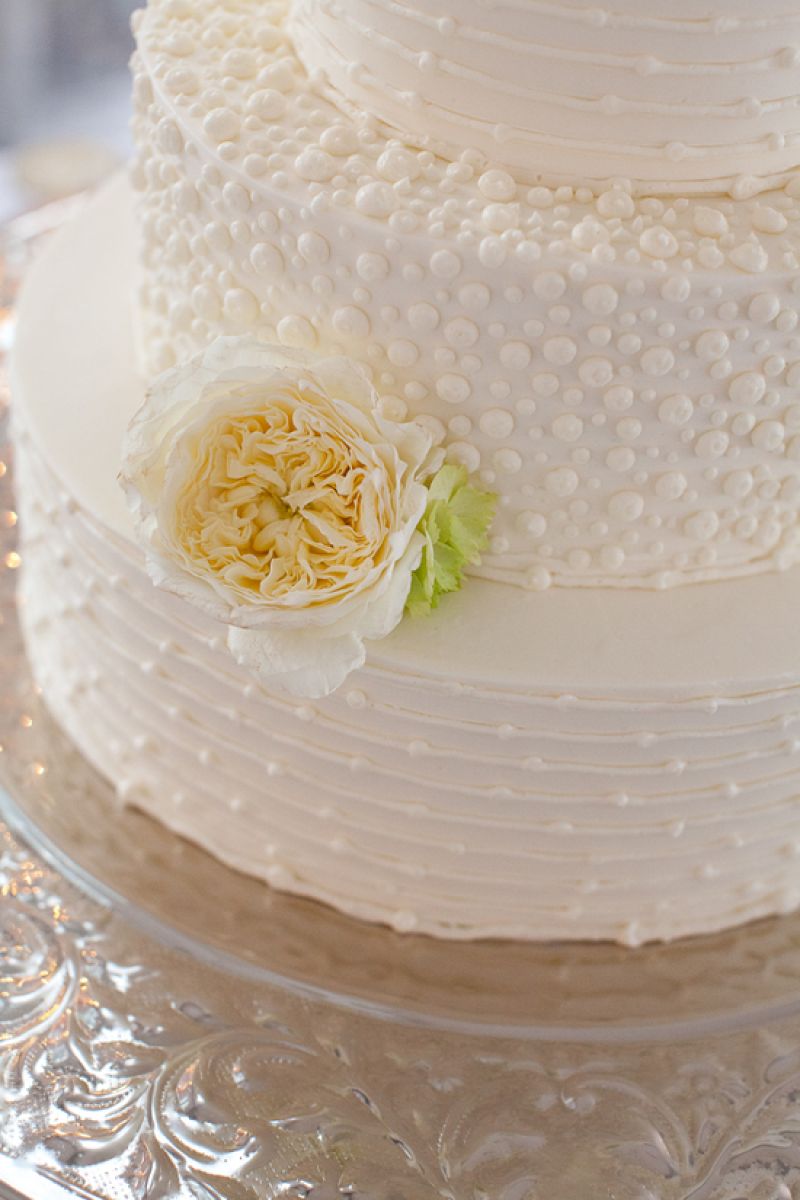 SECOND HELPINGS: The reception wasn’t the only place the newlyweds enjoyed a sweet slice. “We woke up at 6:00 the next morning starving, and ate leftover wedding cake right then and there in bed,” says Brianna.
