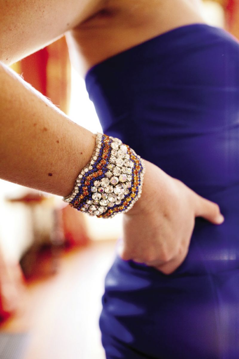 CUFF HER: Jessica gave Maggie, her sister, maid of honor, and sole attendant, a jeweled cuff that matched her bridal sash.
