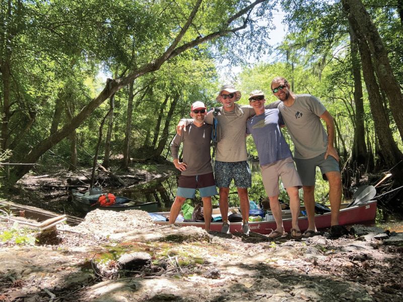 Launch Day in Late May: Spirits were high as the paddlers navigated narrow stretches of black water; (left to right) Ryan “Co” Coverdale, Ryland Fox, Brooks Geer, and Stratton Lawrence.