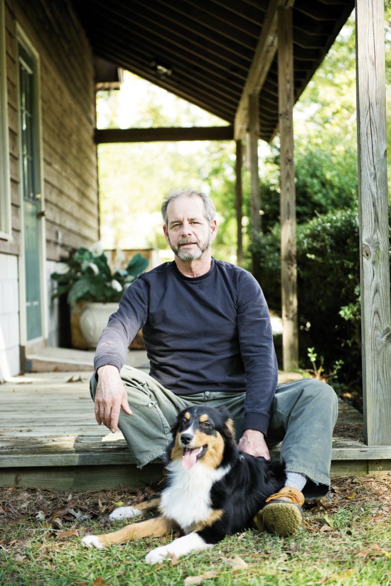 Dave with pal Bugsy outside his McClellanville processing facility, which he has plans to expand into a food hub, of sorts, where he’ll sell his shellfish products as well as local organic produce and meats.